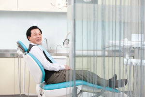 happy patient laser periodontal care concept
